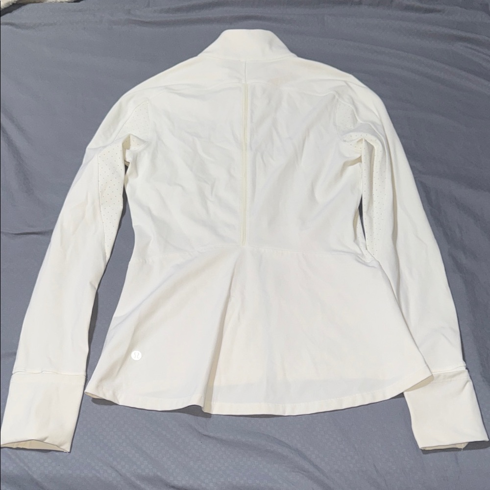 Lululemon Sleek Essentials Jacket
Cream/White size 8 - Picture 10 of 17